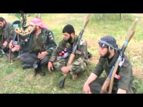 جلسة شعرية مع عناصر لواء الحمزة أسد الله أثناء محاصرتهم لمطار الضبعة العسكري في ريف القصير في حمص