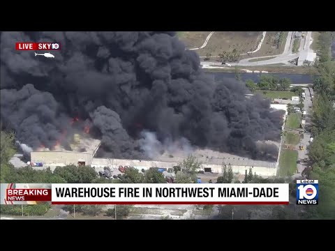 Large warehouse fire burns in northwest Miami-Dade