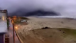 Oregon coastal beach sand looks like a flowing river during strong winds