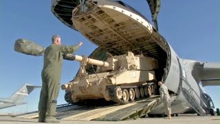 Huge US Transport Aircraft C-5 Galaxy Swallowing A M109A6 Howitzer