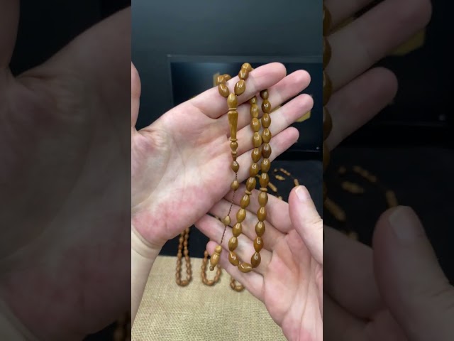 سبحة كوك طبيعي بحبات أسطوانية متوسطة وشرابة أنيقة