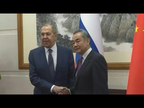 China and Russia top diplomats meet to deepen ties | AFP
