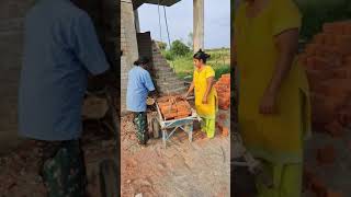 Lifting 40 Bricks to 2nd Floor for Construction Work