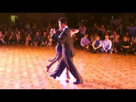  Roxana Suarez  and  Sebastian Achaval  are  dancing  to  the  tango  "  Un Infierno  "  by  Miguel Caló  at  Brussels Tango Festival  in  2014