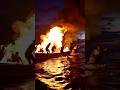 A boat burns with people on board!!! #explore #shorts #shortvideo #viralvideo #fire #ocean #burning