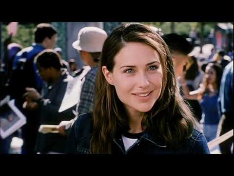 Trailer frame: foam-club party energy hinting at the Apollo 440 dance set-piece