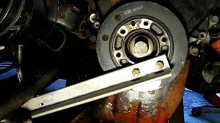 Dodge Caravan 3.0L replacing timing belt, water pump and front seals part 3: Dis-assembly 3