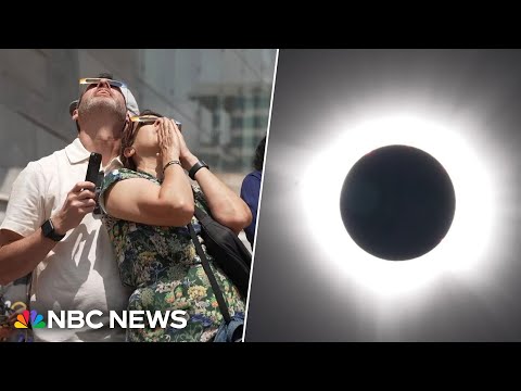 Watch emotional moments as skywatchers view solar eclipse