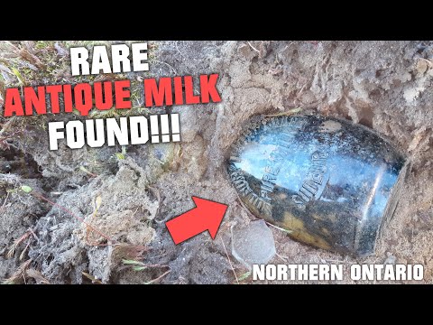 FOUND, RARE EMBOSSED SLUG PLATE MILK BOTTLE! Beautiful Antique Northern Ontario Bowling Pin Milk!!