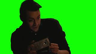 Roman Roy recording on his phone — Succession green screen