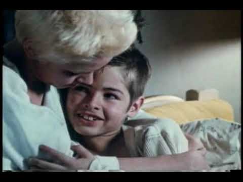 1983 Suburbia trailer frame with punk teens in a Southern California tract neighborhood