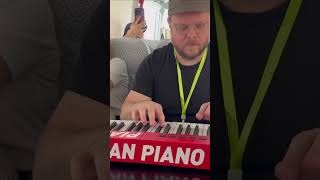 Playing Piano on the Bus