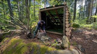 Building a warm shelter for survival in the forest, solo bushcraft camping in the wild