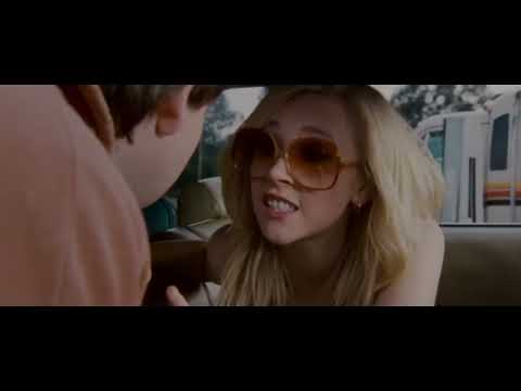 Trailer image suggesting school corridors, back seats, and highways—typical spaces where the film’s pop cues land