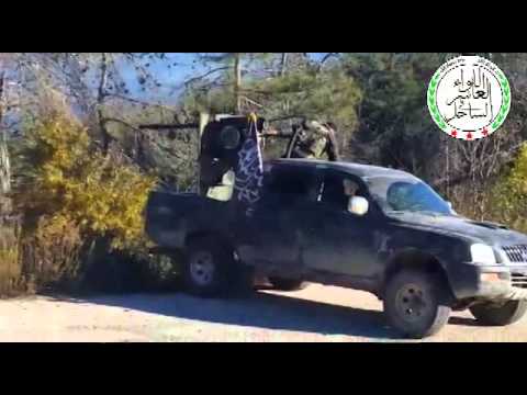 جولة ميدانية مع مقاتلي الواء العاشر في الساحل أثناء معارك السيطرة على برج زاهية في ريف اللاذقية