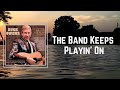 Buck Owens - The Band Keeps Playin On (Lyrics) 🎵