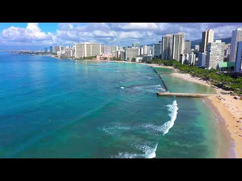 An aerial view of modern buildings near the sea in Waikiki, Hawaii
