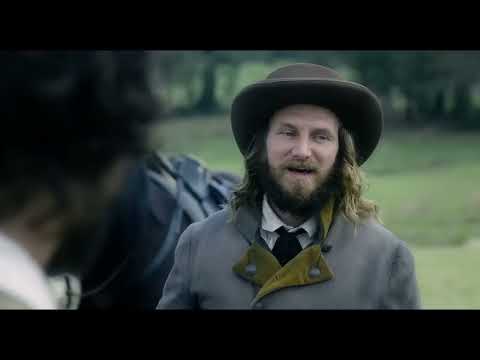 Trailer climax: militia faces down in a field as the score shifts from motif to sustained chords