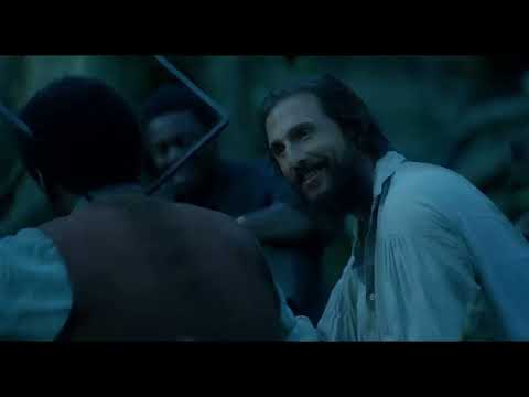 Free State of Jones official trailer frame with Newt Knight crossing a battlefield as mournful strings suggest the score’s tone