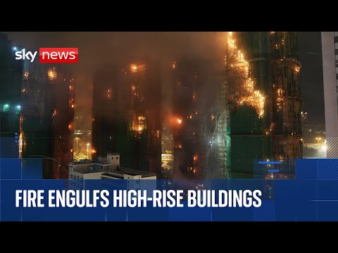 13 people killed in fire engulfing Hong Kong high-rise residential buildings