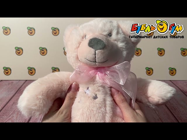 Игрушка мягкая мишка с бантом розовый 25см - видео