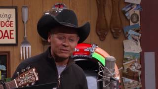 Neal McCoy sings  "A New Mountain to Climb"