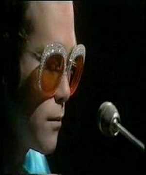 download lagu mp3 mp4 Elton John Glam Rock, download lagu Elton John Glam Rock gratis, unduh video klip Elton John Glam Rock