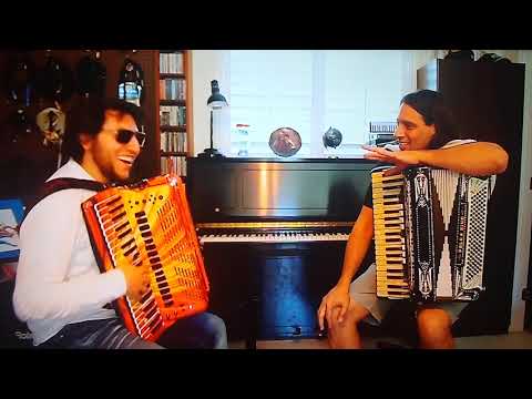 Alex Meixner teaching Corey Pestatiro how to play Oj, Marcia Peglaj (Mary is Ironing)