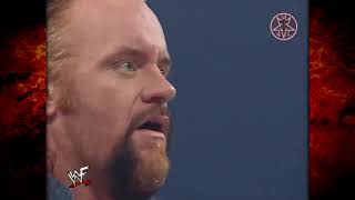 Kane Destroys & Busts open Injured Undertaker 