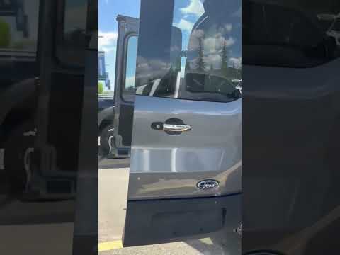 2022 Ford Transit Cargo Van T-150 130" Med Rf 8670 GVWR AWD in Gray for sale at Advantage Ford in Calgary, AB