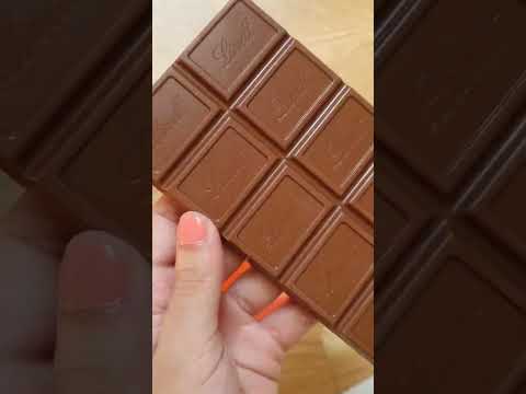 Creamy Lindt Lindor Orange Chocolate #lindt #asmr #tiktok #shorts #Switzerland #chocolate