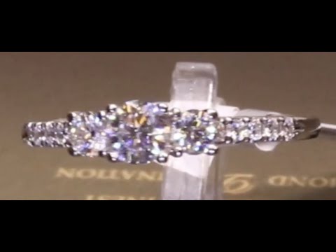 #75782 | T0.50ct/C0.24ct | Three Stone Round Brilliant with Diamond Set Shoulders, set in platinum