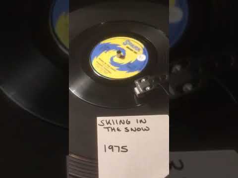 Wigans Ovation - Skiing In The Snow from 1975 ( Vinyl 45 ) .