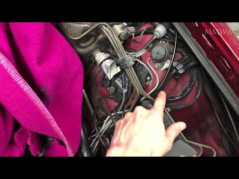 Red W124 project - some more assembly today. Rad hoses, pulleys etc