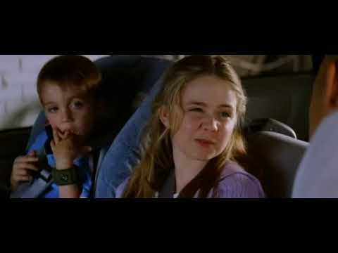 Trailer image: school stage lights hinting at The Sound of Music numbers that drive the third act