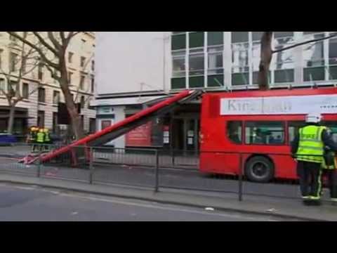 London bus crashes into tree, rips off roof