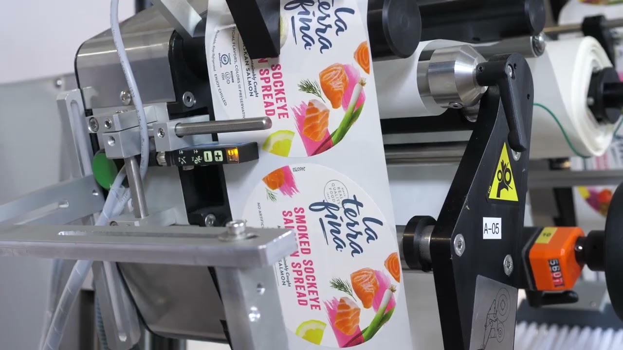 Labelling: Salad container Zero Downtime high speed labeling machine By Tadbik