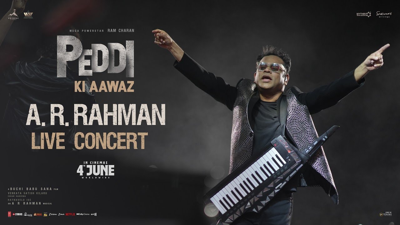 Peddi Movie Promotional Event Live Musical Stage Performance in Bhopal with Golden and Red Lighting Scene