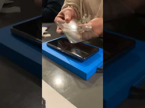 Applying Tempered glass on a quad curved display smartphone.[Honor magic 6 pro] #honor