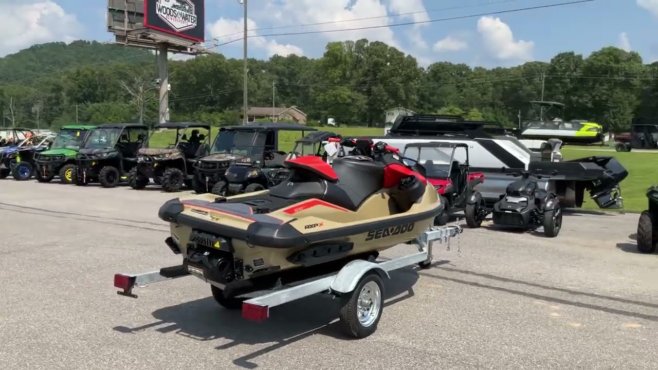 A photo of this 2025 Sea-Doo RXP-X 325 Tech, BRP Premium A, iBR Metallic Tan / La