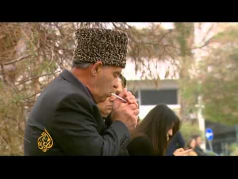 Cyprus fiscal mess spreads in divided island