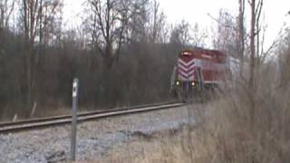 preview picture of video 'Wisconsin & Southern MP15AC # 1504 Rockets Into Cedarburg, Wisconsin with a LONG TRAIN! (3/27/10)'