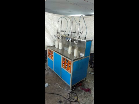 Four Head Liquid Filling Machine