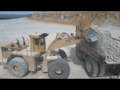 Caterpillar 992C Wheel Loader Loading Caterpillar 777F Dumpers - Interkat SA - Drone View