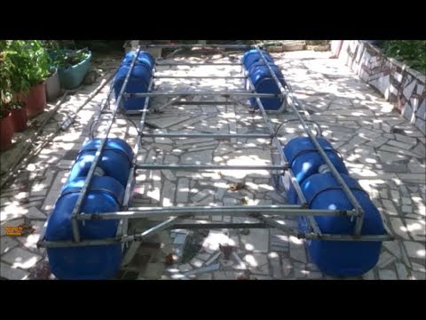 How to make a portable pontoon boat with big plastic bottles for multi purposes Video