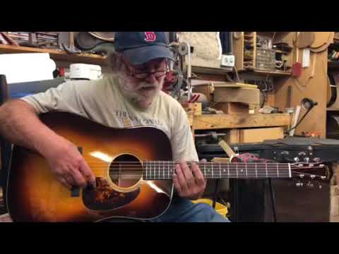 Wayne Henderson plays the first tune on a guitar that he built for the Gibson Brothers