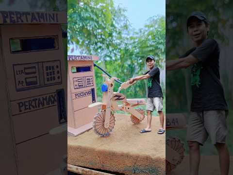 creative video of filling up motorbike petrol at Pertasop🏍️⛽