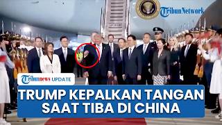 Momen Trump Disambut Meriah saat Tiba di China, Sempat Hentikan Langkah dan Kepalkan Tangan