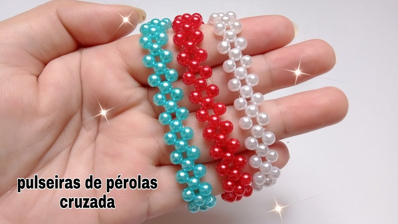 Watch Now Pulseiras em pérolas cruzada/ passo a passo para iniciantes. Pulseiras em pérolas cruzada/ passo a passo para iniciantes.