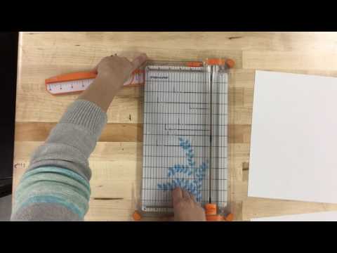 Part of a video titled How to use the paper cutter - YouTube